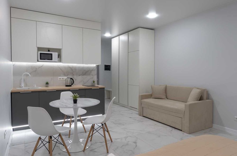 Завжди є світло! Затишна студія з панорамним видом на місто.