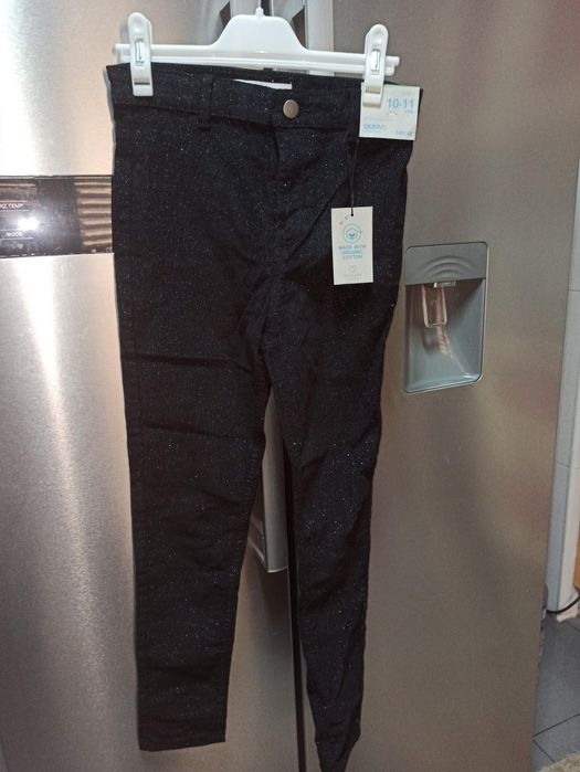 Calças pretas com brilho NOVAS 10/11 anos