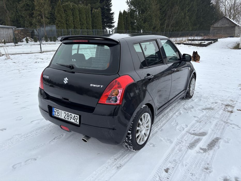 Suzuki Swift 1.3 benzyna 2009 klima,2 komplety kół,130.000 km przebieg