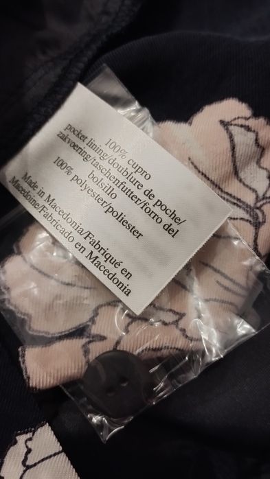 Spodnie typu palazzo z cupro marki Laura Ashley.