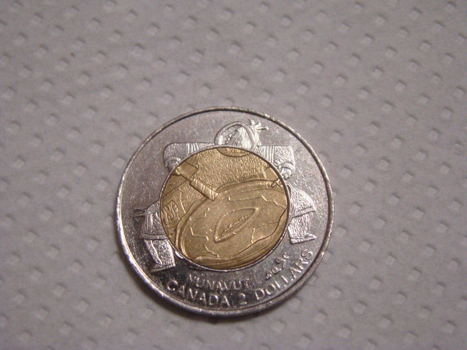 Продам колекційну монету 2 канадських долари НАНАВУТ  1999 р
