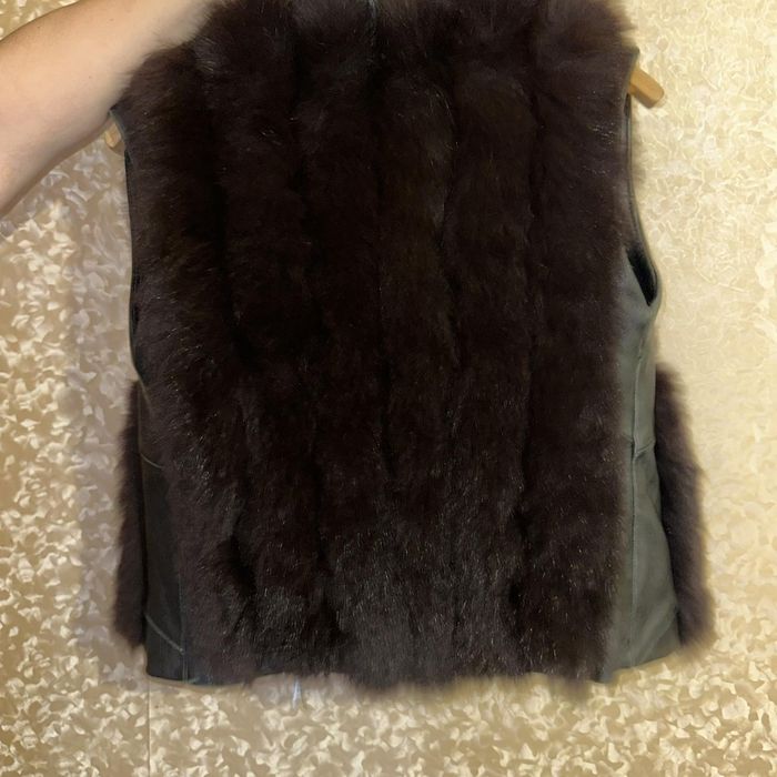 Продам меховую желетку