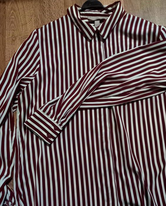 Продам стильную атласную женскую рубашку H&M. Размер 40.
Спереди короч