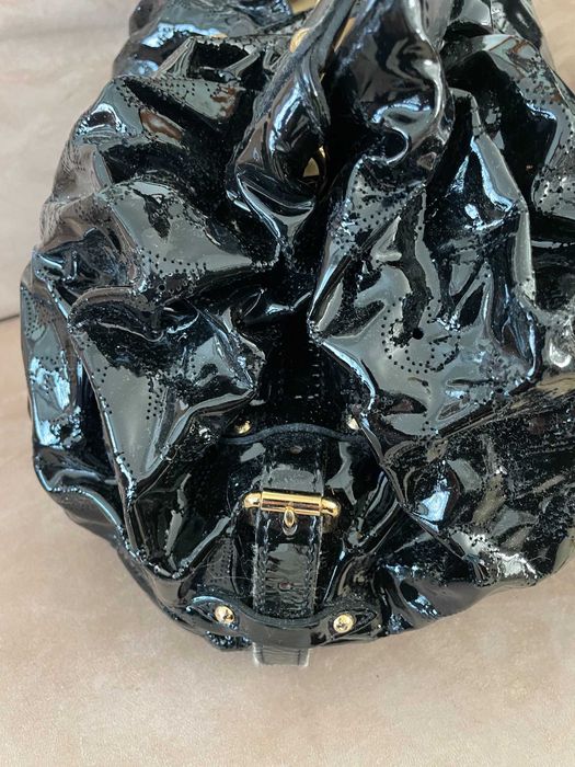 Mala LOUIS VUITTON – modelo Mahina Surya  tamanho XL
