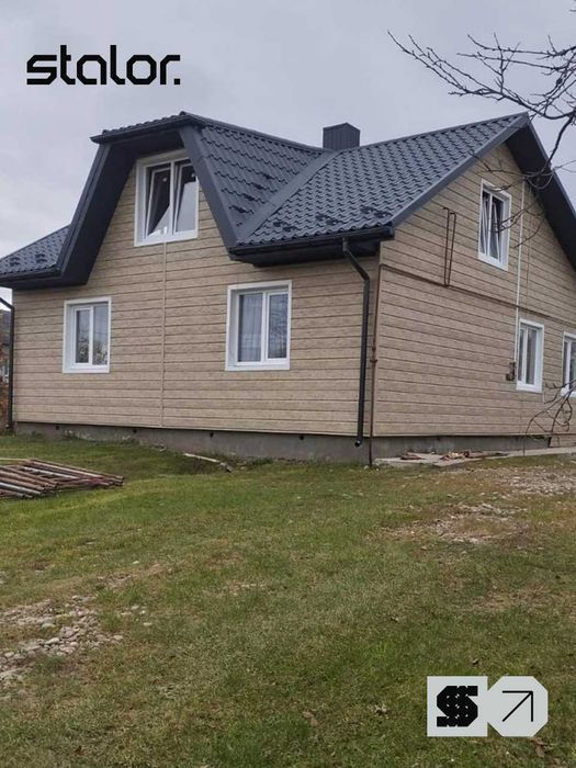 Металевий сайдинг під дерево. Фасадні панелі. Стрий