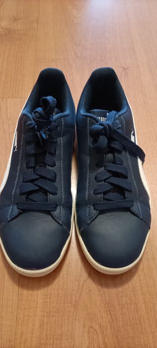 Tennis puma azuis escuros em pele