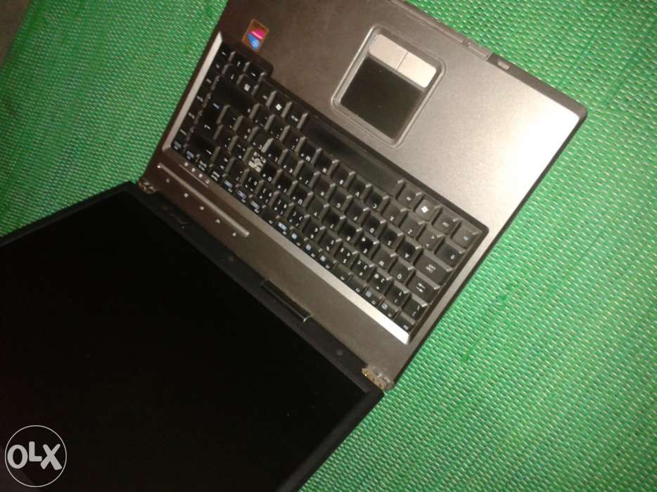 Damaged Asus A3000 laptop, already missing some parts.64354220328451122