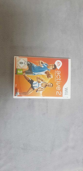 Consola WII + conjunto de acessórios e jogos