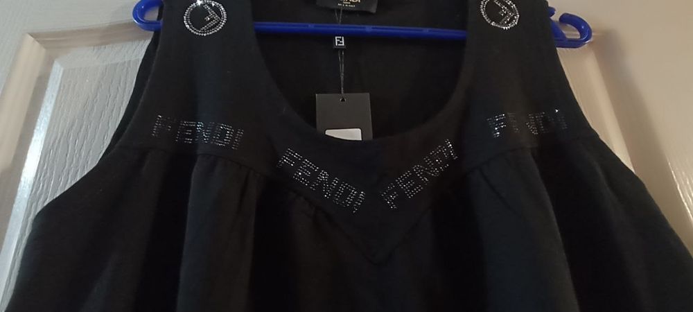 Продам нарядну туніку 50-52. Можна й вагітним