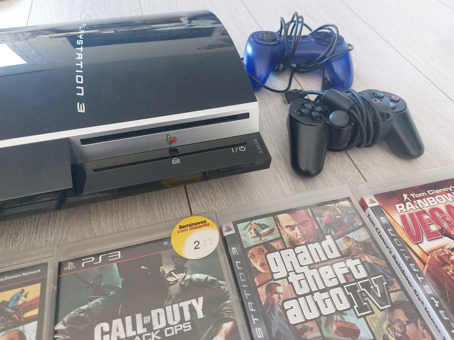 Sony PS3 + 2 comandos + 10 jogos