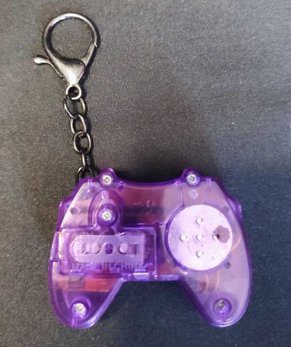 Consola retro em chaveiro