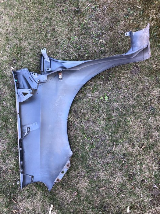 Blotnik przedni prawy Fiat Punto Evo