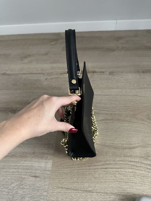 Skórzana mini torebka z rączką Ryłko