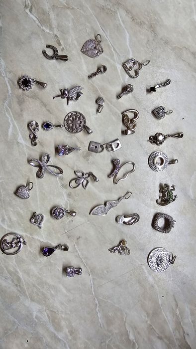 Серебрянные кулоны,крестики