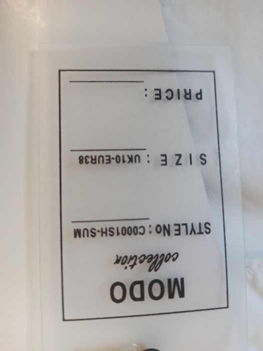 Bawełniane spodenki z metką