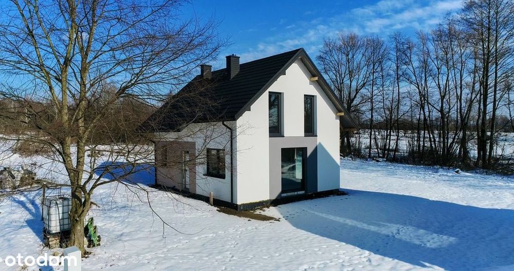 dom z dużymi przeszkleniami i potencjałem