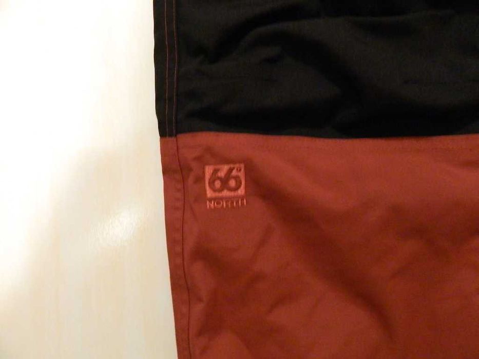 spodnie chłopięce 66 North narty snowboard materiał cordura 164cm nowe