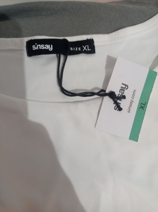 Białe body z metką