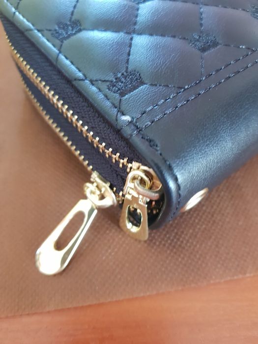 Гаманець на двох блискавках.