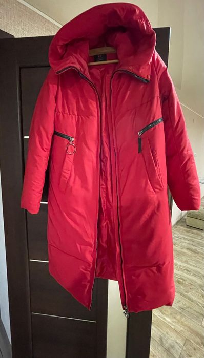 Продам пуховик б/у