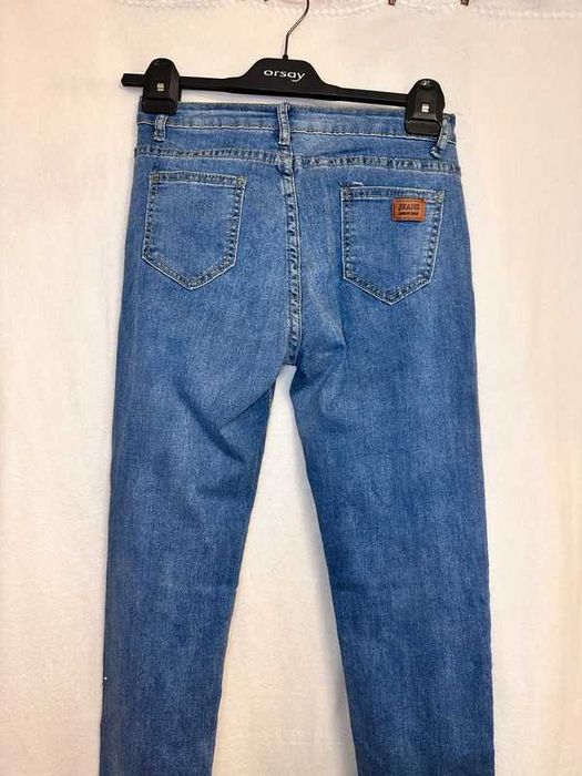 jeansowe spodnie rurki z wysokim stanem