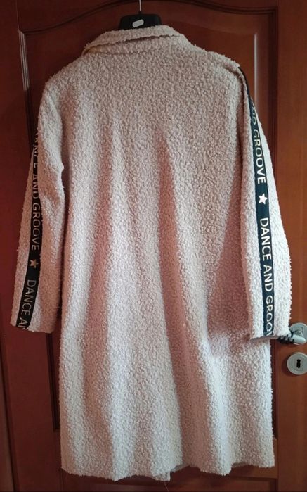 Płaszcz rozmiar 42/44 marki Butik