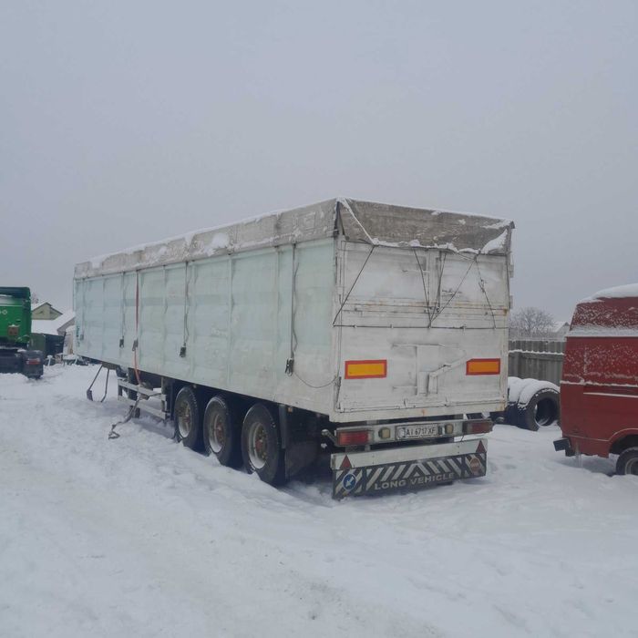 Шміц полуприцеп 67м3