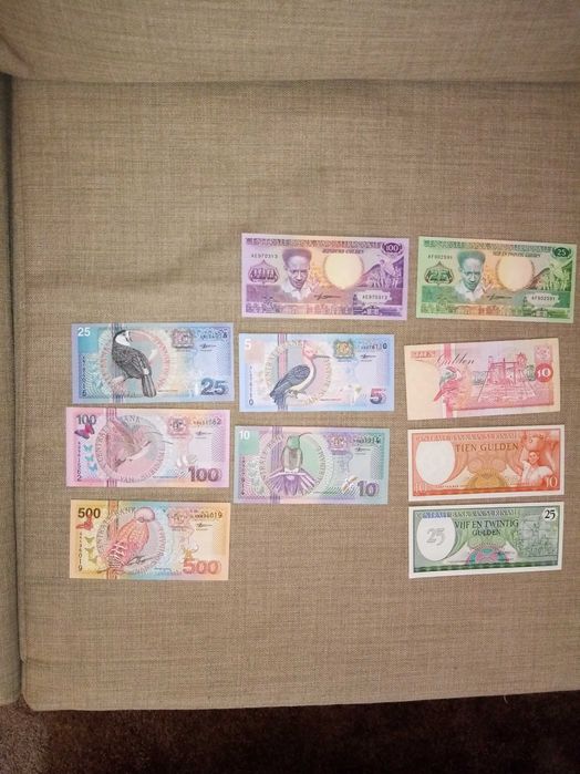 SURINAME 10 Notas NÃO CIRCULADAS em 2 Séries Conforme as fotos