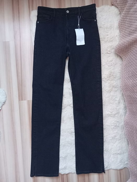 Spodnie czarne rozcięte nogawki Bershka