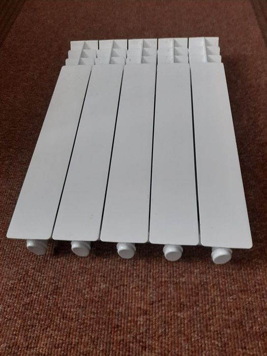 Радіатор алюмієвий новий