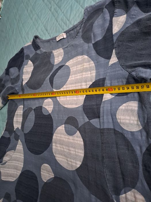 Tunika z kieszeniami.