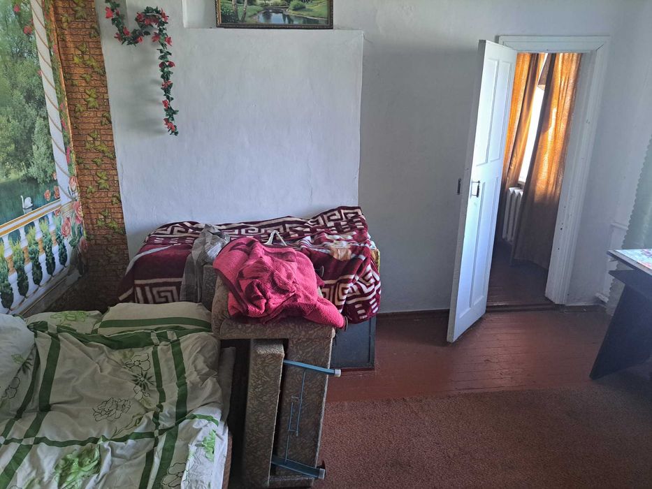 Продам 1/2 будинка