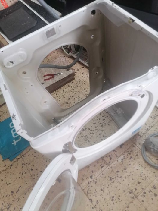 Candy, Peças várias de máquina lavar roupa.