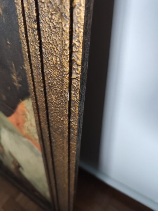 Quadro com moldura em madeira talhada