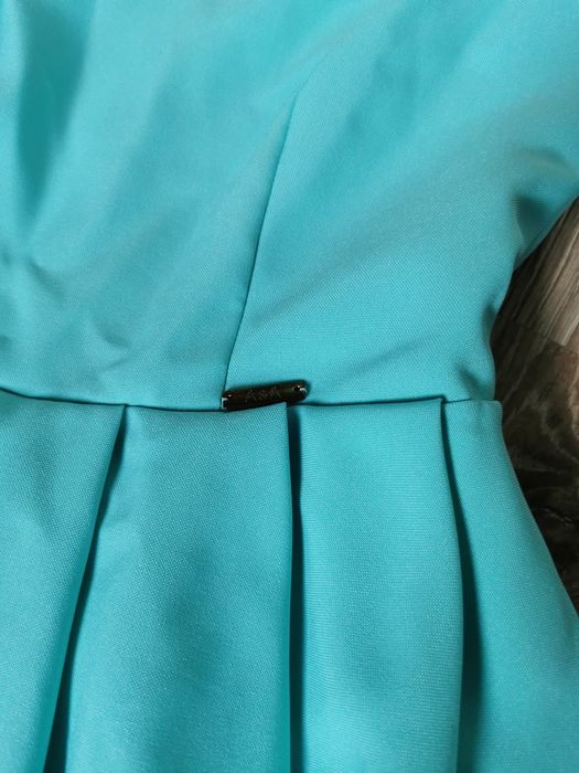 Miętowa sukienka koktajlowa 38 M