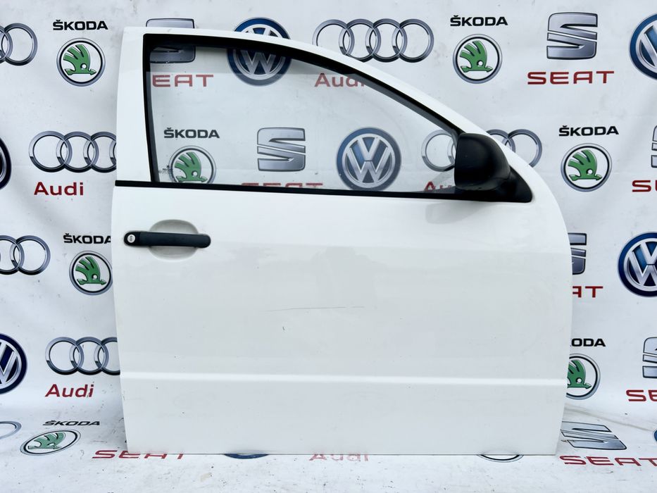 Двері передні Skoda Fabia 1 Шкода Фабія 99-07