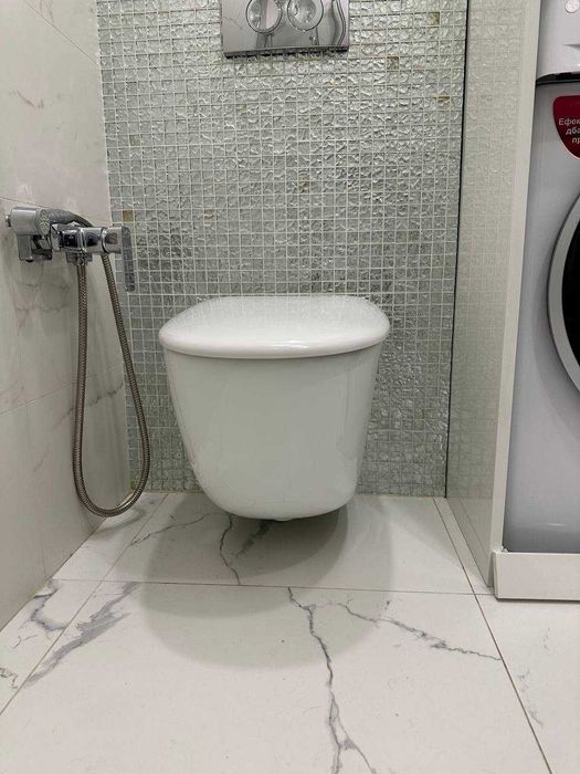 Унітаз підвісний RAK Ceramics Sensation SENWC1446AWHA з кришкою