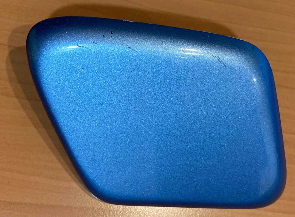 Накладка форсунки омивача для передньої фари Nissan 28658AX600