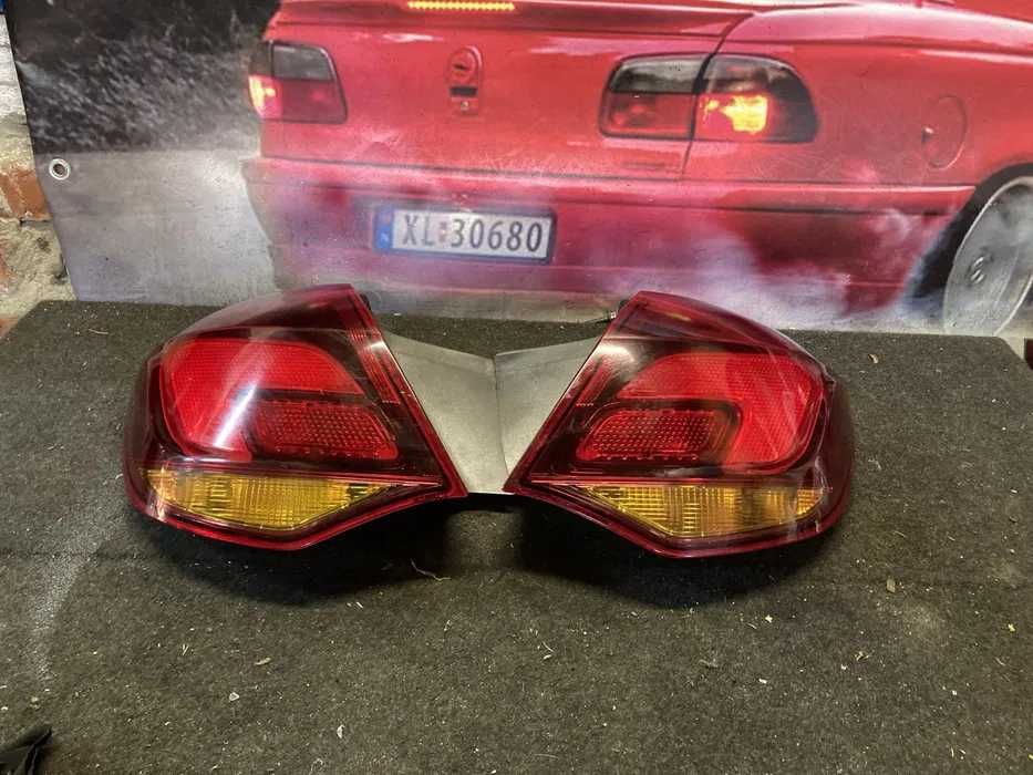 Стоп габарит ліхтар лівий правий Opel Astra J хечбек