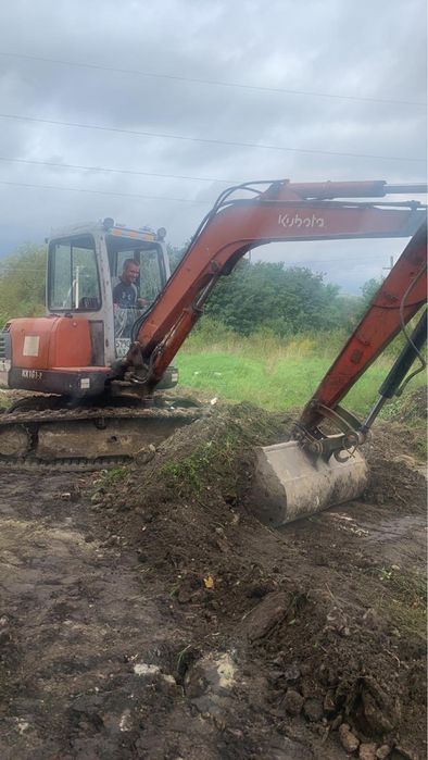 JCB.екскаватор бобкат