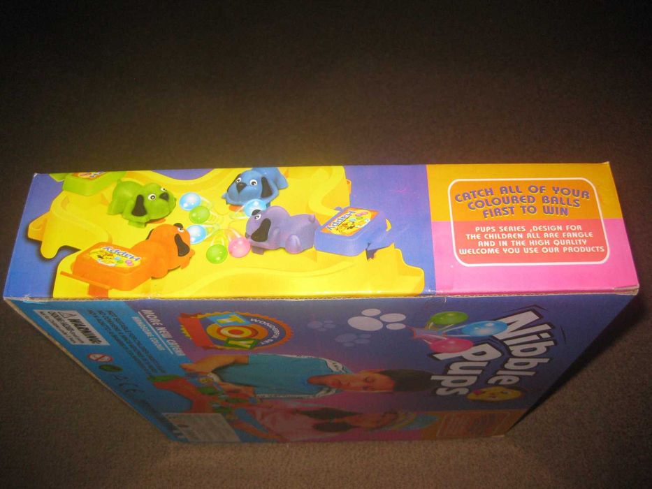 Brinquedo "Nibble Pups" Novo e Embalado!