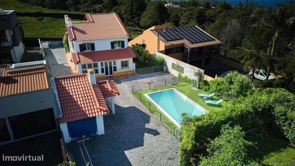 Moradia T3 Exclusiva com Piscina, Jardim e Encanto Rústico em São Vice