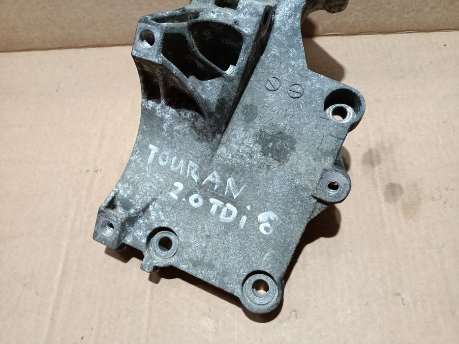 Łapa mocowanie alternatora pompy kompresora 2.0 TDI VW Audi Seat Skoda