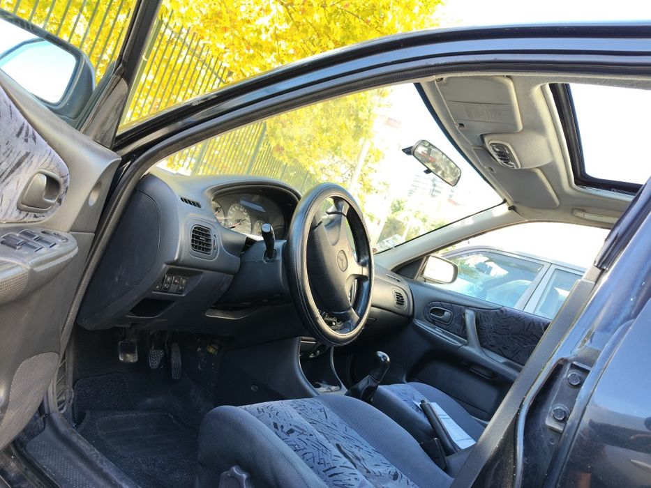 Vendo Mazda 323F com inspeção feita recentemente, feita em setembro de 2026.