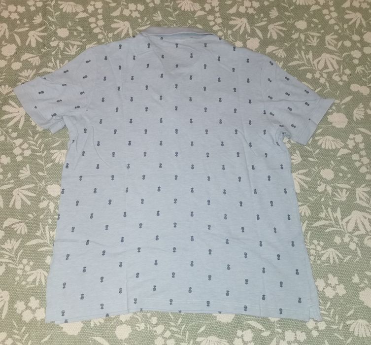 Pólo azul claro com palmeiras H&M XL