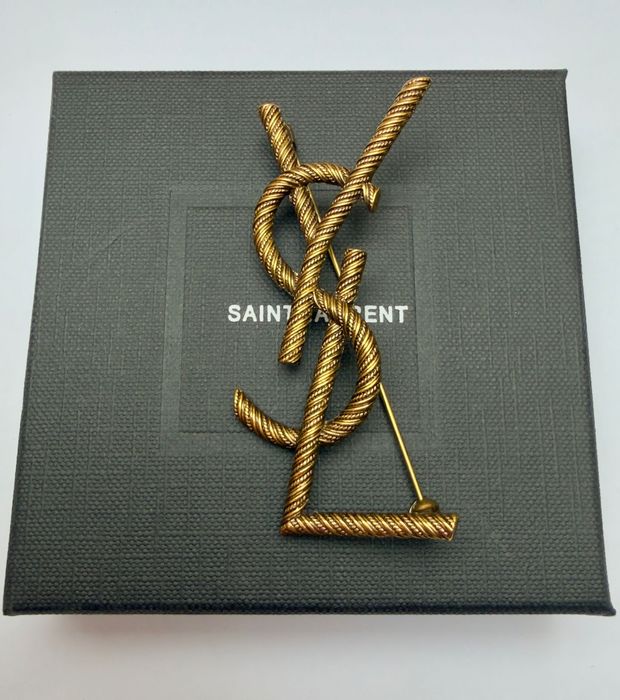 Broszka YSL stare złoto 7 cm