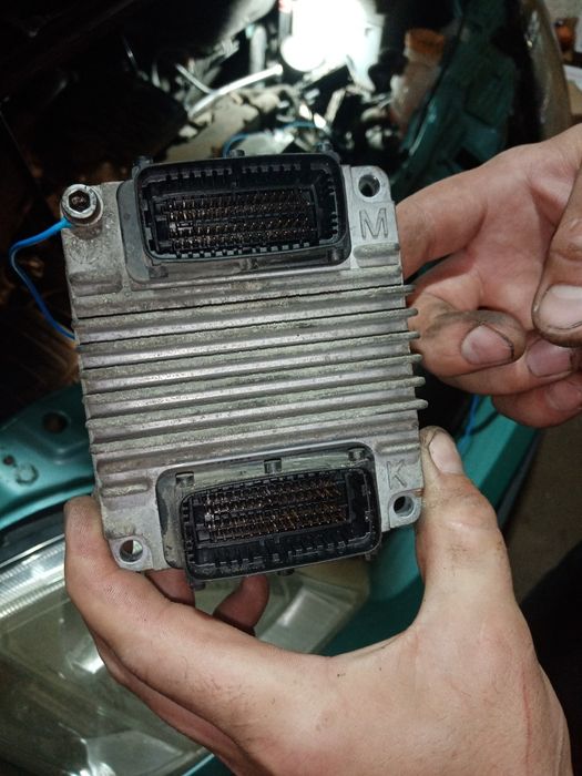 12242000- ЭБУ Opel Meriva