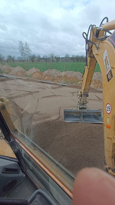 Usługi koparko-ładowarką CAT | ZIEMIA ŻWIR PIASEK POSPÓŁKA