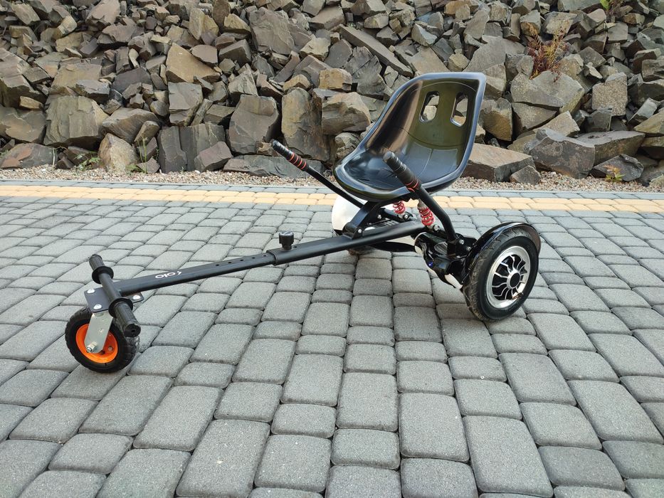 Hoverboard plus przystawka jeździk.