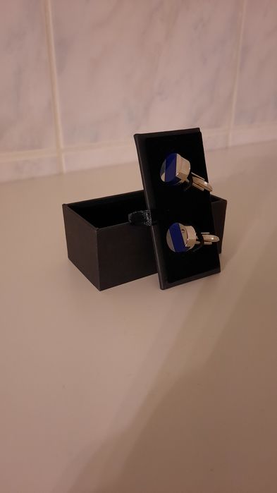 Botões de punho com azul